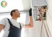an engineer fitting boiler at the property under ECO4 scheme